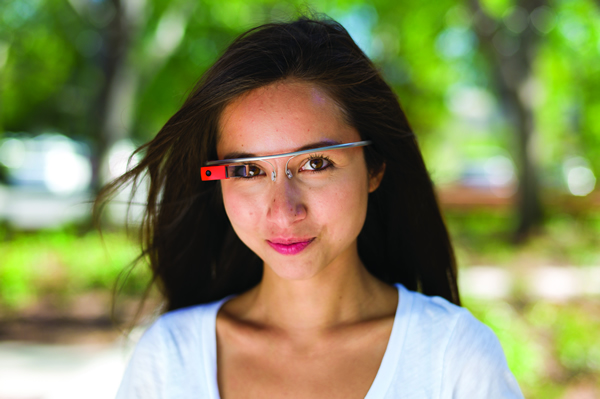 I - Google executive Amanda Rosenberg modeling the Google Glass face mounted wearable computer