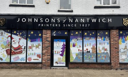 Johnsons in Nantwich installs Christmas window graphics with help from Contra Vision