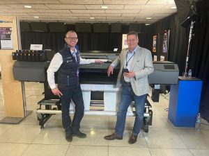 printMax's MD, Michael Bolton (right) with Roland DG's regional general manager for UK, Ireland, Scandanavia and Baltics, Rob Goleniowski